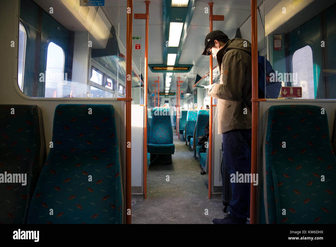 Strangers travelling in Glasgow Stock Photo