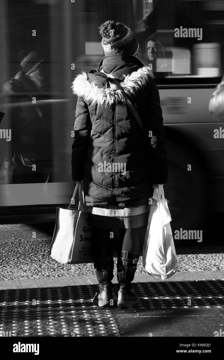 Strangers travelling in Glasgow Stock Photo