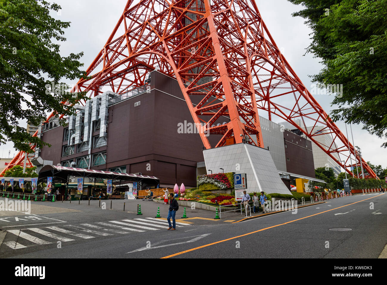 Tokyo -  Japan, June 18, 2017: Tourists passing by the foot town of Tokyo Tower in the Shiba-koen district of Minato Stock Photo