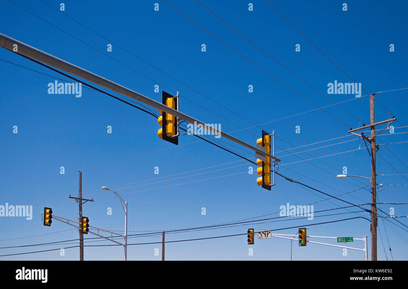 American traffic lights at a crossroad with a clear blue sky, Texas