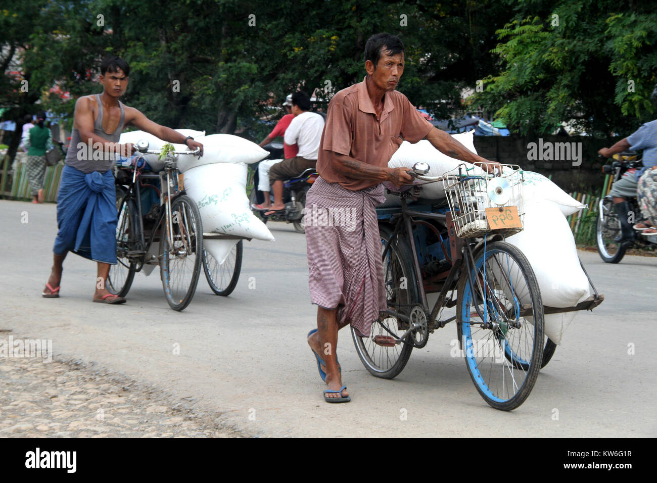 Two tricycles on the road near Inle lake, Myanmar Stock Photo Alamy