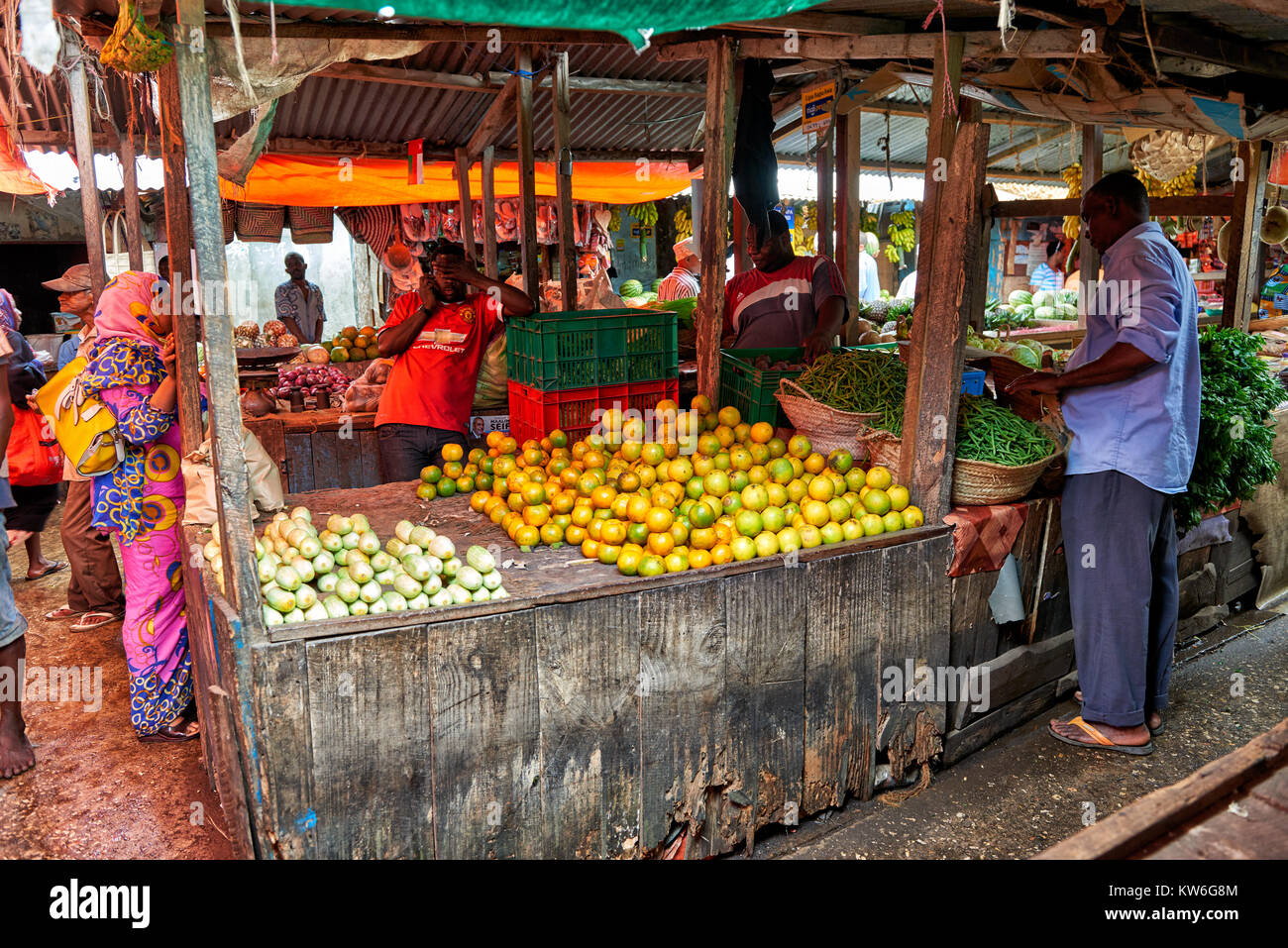 fruits and vegetable department on local food market in Stone Town,UNESCO World Heritage Site, Zanzibar, Tanzania, Africa Stock Photo