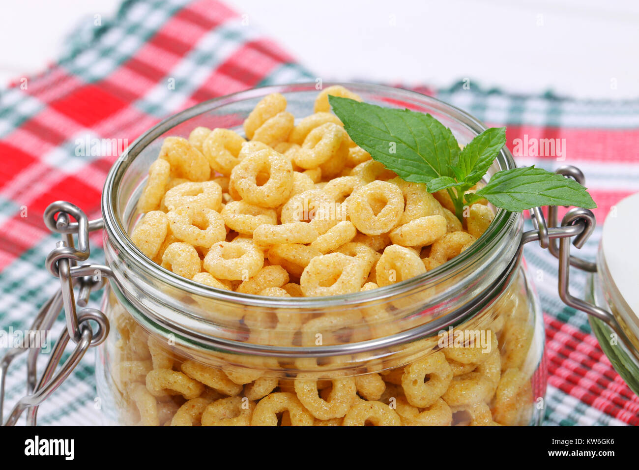 Download Jar Of Honey Cereal Rings On Checkered Place Mat Close Up Stock Photo Alamy PSD Mockup Templates