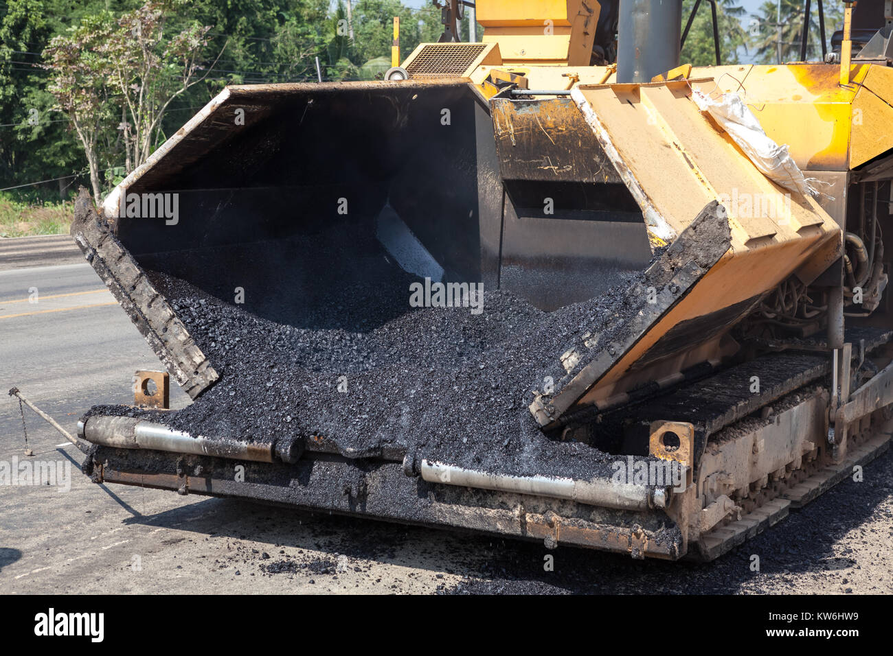 an asphalt machine in close up for the renewal of the asphalt Stock Photo