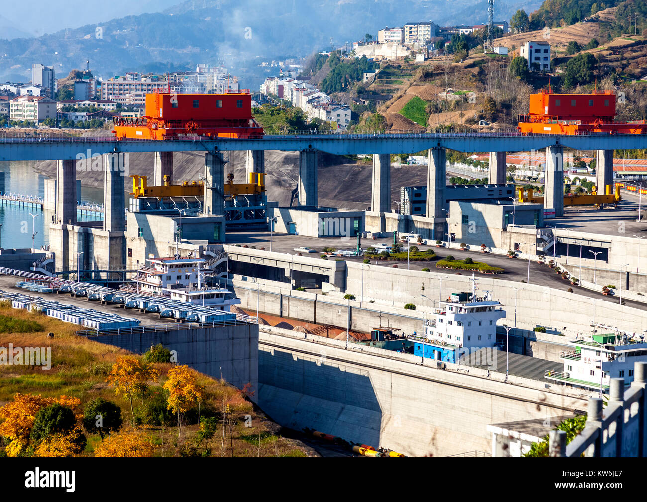 Cargo boats about to exit top lock of Three Gorges Dam on Yangtze River in China Stock Photo