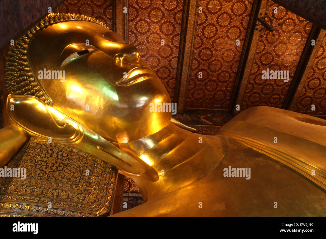 Golden Buddha statue in temple, wat Pho, Bangkok, Thailand Stock Photo ...