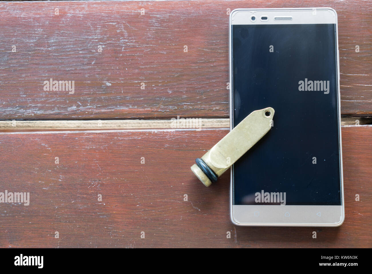 Mobile Phone Hotel Key Chain on Wooden Table Bozcaada in Canakkale 2017