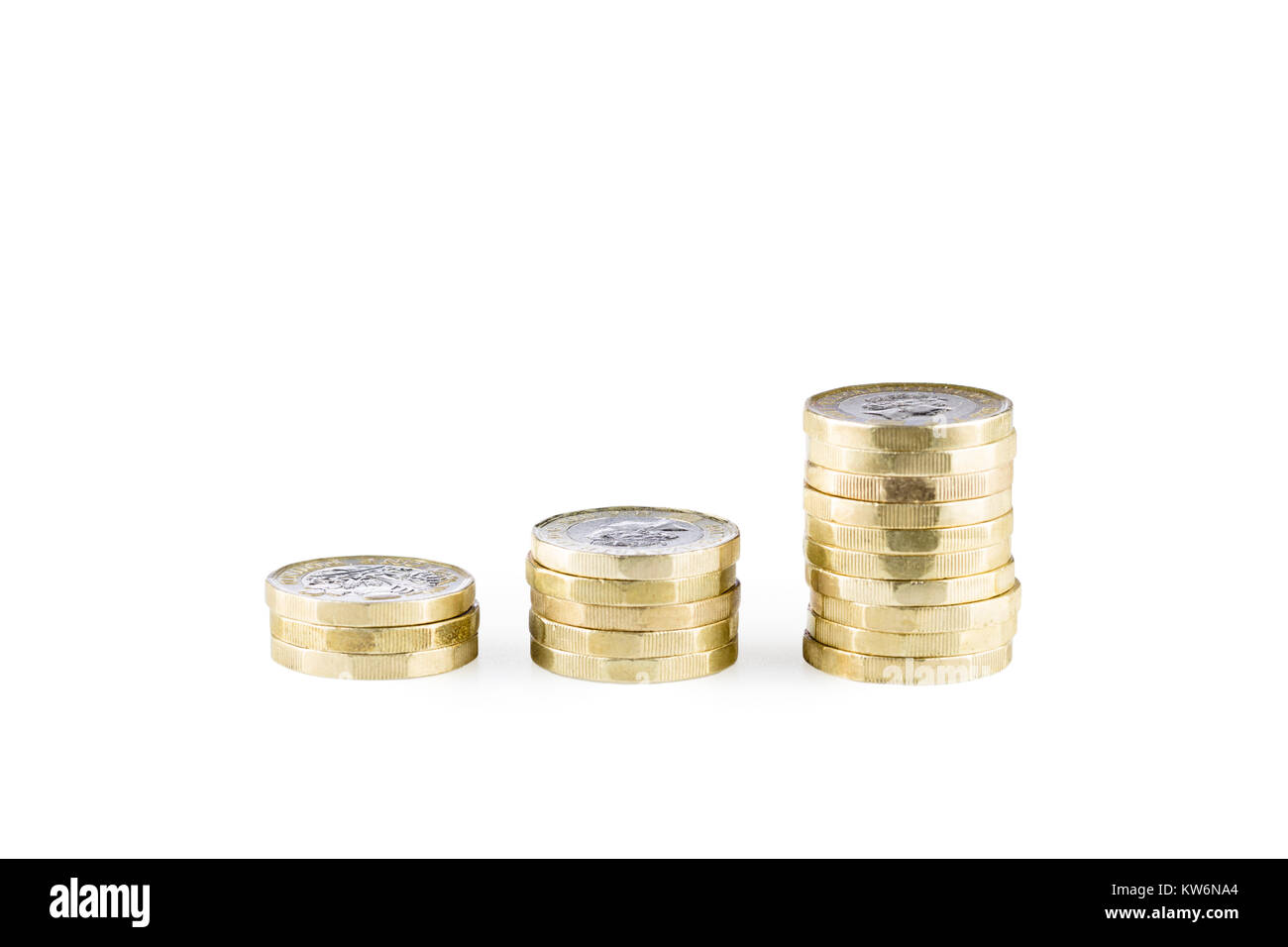 Piles of uk sterling pound coins Stock Photo