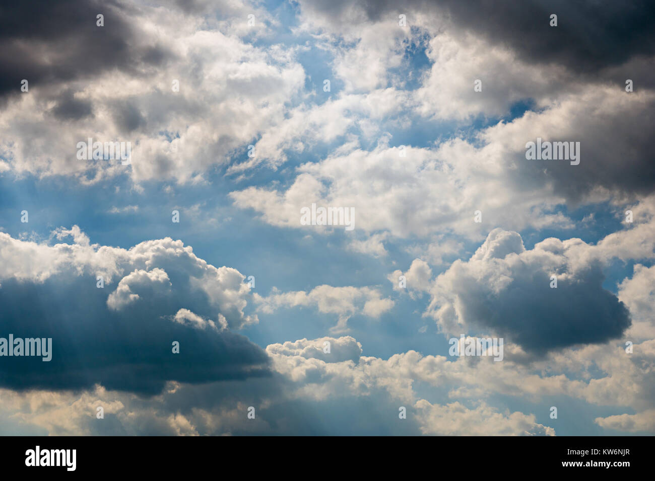 Sunny weather with cumulus clouds on bright blue sky Stock Photo - Alamy