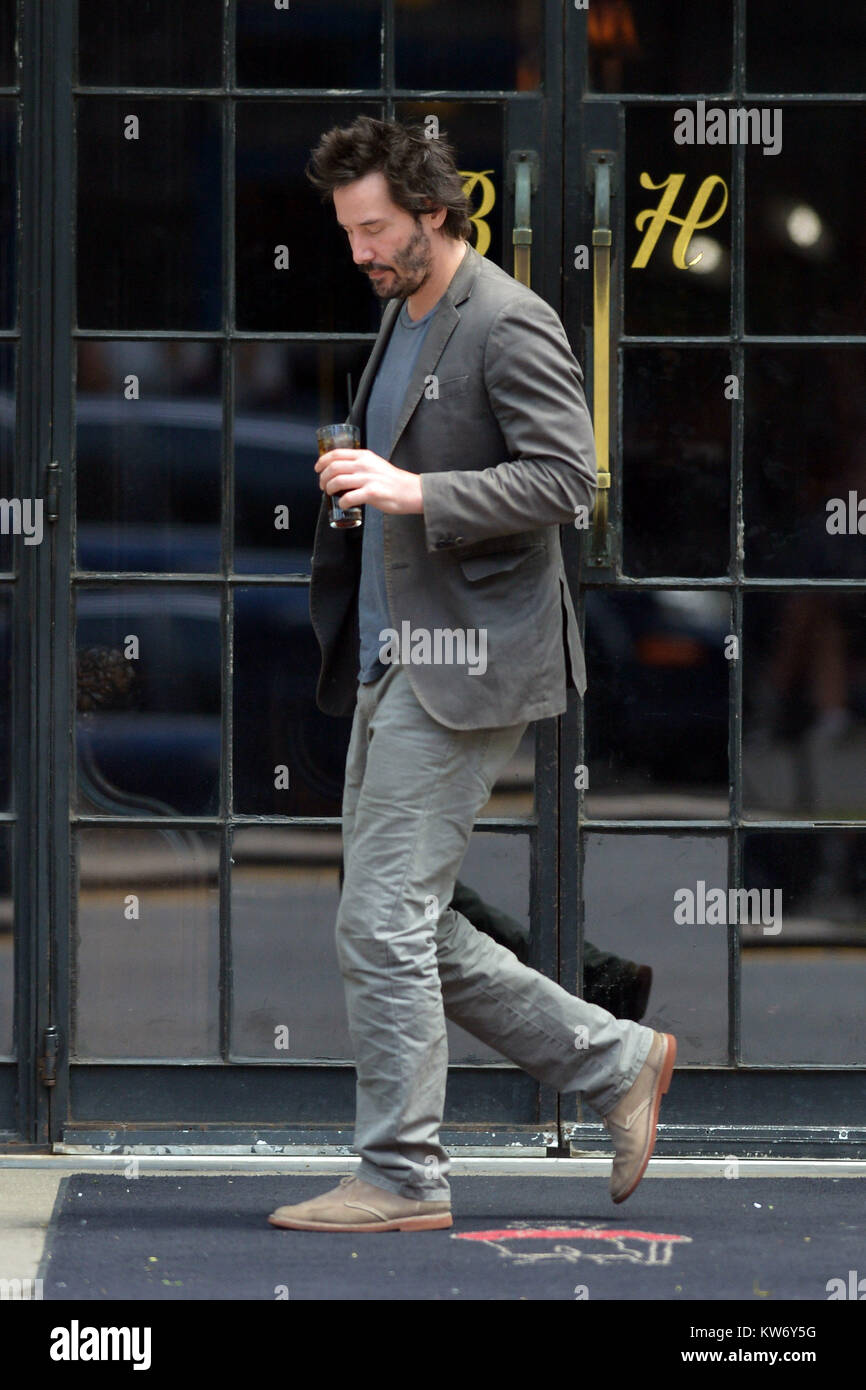 Keanu reeves sips an iced coffee in downtown manhattan hires stock