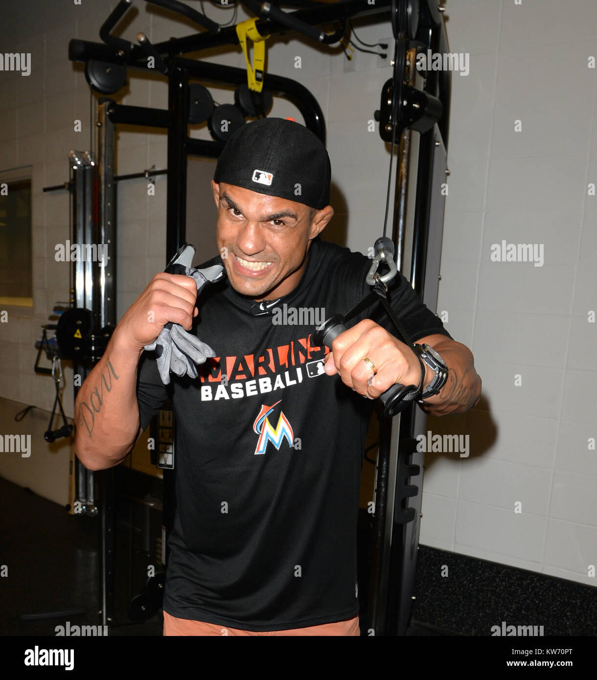 MIAMI, FL - AUGUST 19: (EXCLUSIVE COVERAGE) UFC Fighter Vitor Belfort pays a visit to his Miami Marlin friends and grabs a quick Haircut at Headzup with the Marlins Barber Hugo “Juice” Tandron prior to their game at Marlins Park. Vitor Vieira Belfort is a Brazilian mixed martial artist and former UFC Light Heavyweight Champion as well as UFC 12 Heavyweight Tournament Champion. Belfort was born in Rio de Janeiro and studied jiu-jitsu with the Gracie family, namely Carlson Gracie. As of July 22, 2014, he is #2 in official UFC middleweight rankings, #13 in light heavyweight and #12 pound-for-poun Stock Photo