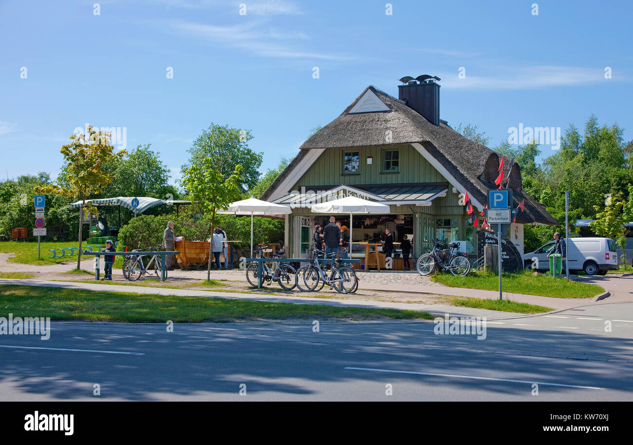 People at a Fish snack shop at the village Ahrenshoop, Fishland, Mecklenburg-Western Pomerania, Baltic Sea, Germany, Europe Stock Photo