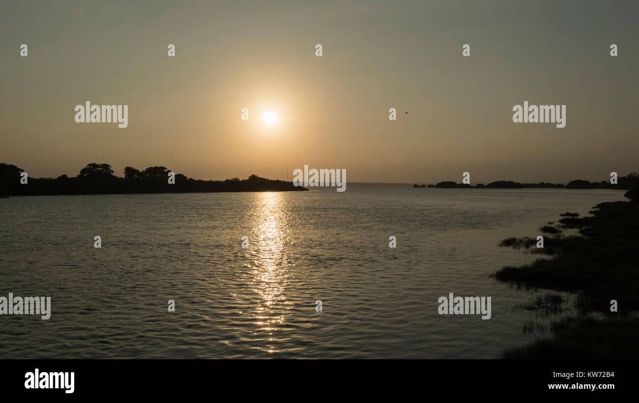 Sunset over Nanthi Kadal Lagoon, Mullivaikkal. The site of many Tamil civilians taken in to Government custody at the end of the Sri Lankan civil war. Stock Photo