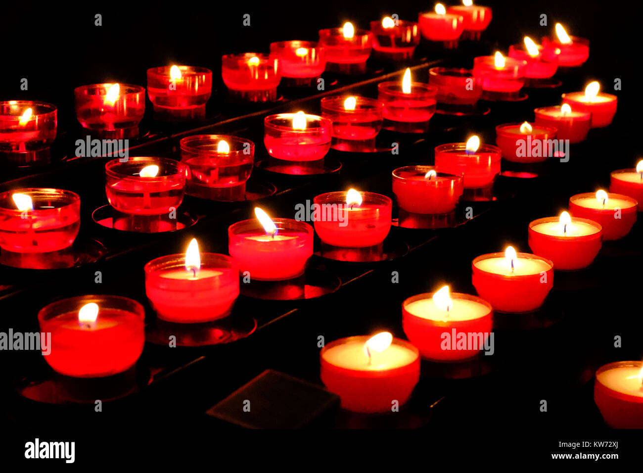 Votive candles in a catholic church Stock Photo - Alamy