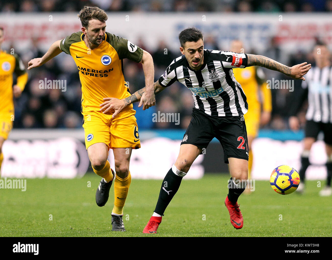 Newcastle United's DeAndre Yedlin (right) and Brighton & Hove Albion's Dale Stephens during the Premier League match at St James' Park, Newcastle. Stock Photo