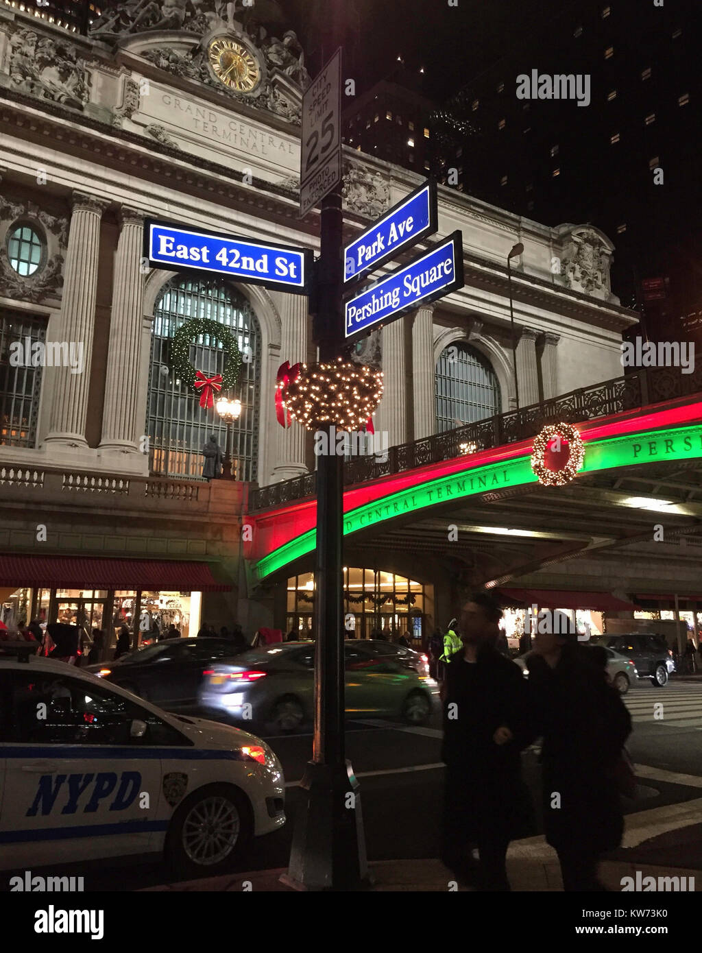 Street Signs and Holiday Lights at Grand Central Terminal and Pershing Square, NYC Stock Photo