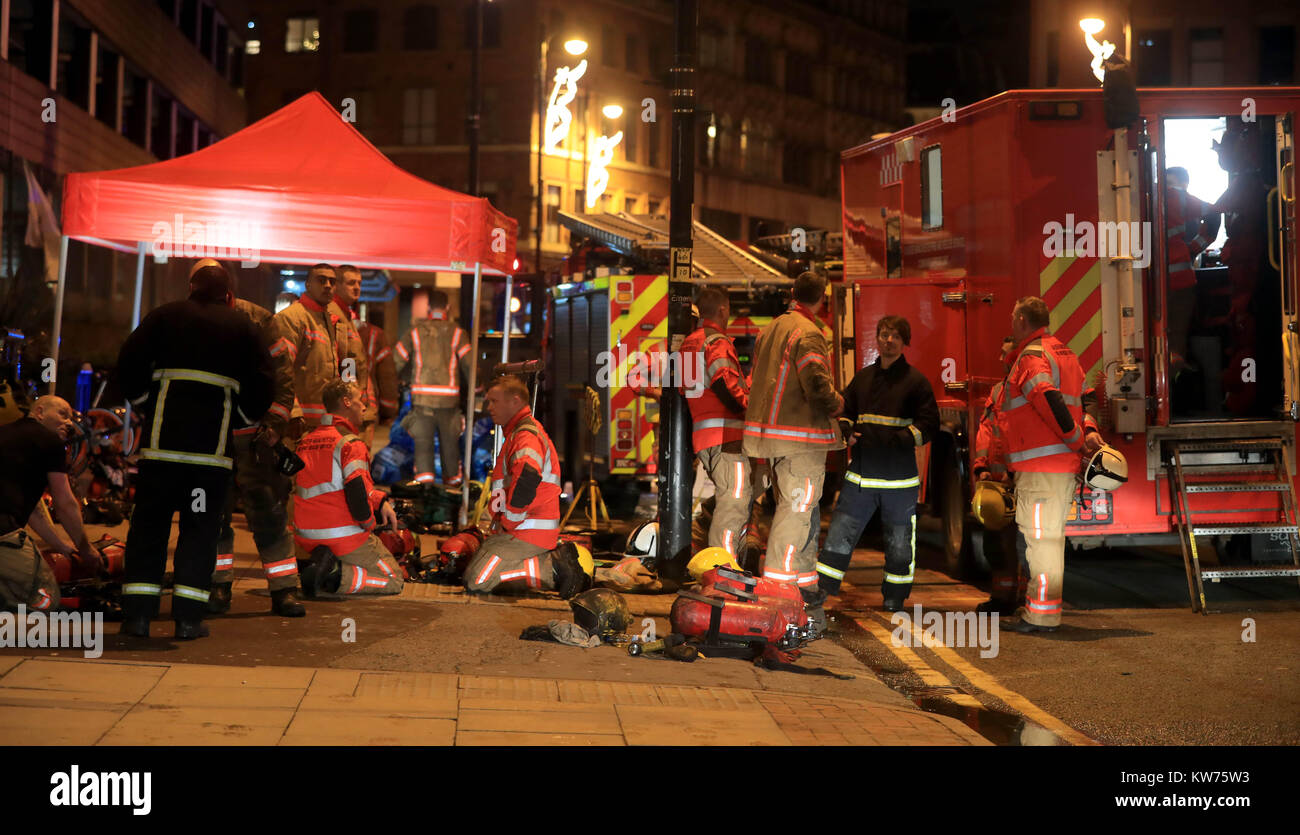 Emergency services at the scene of a fire at a 12-storey building in the Northern Quarter of Manchester. Stock Photo