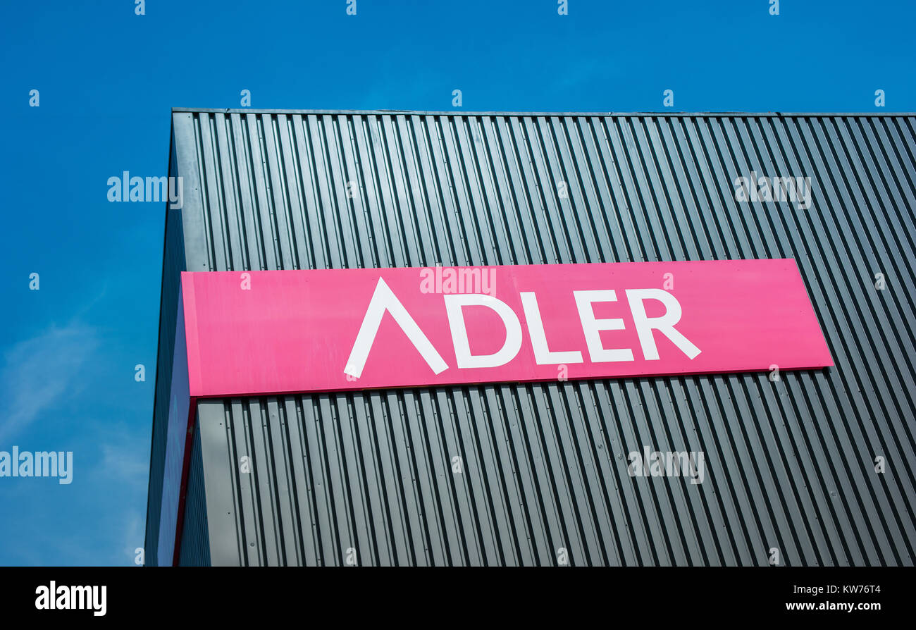 Adler Fashion Logo. Adler Fashion AG is located in Haibach near Aschaffenburg, is a listed retailer chain with 174 stores in Germany, Austria Stock Photo