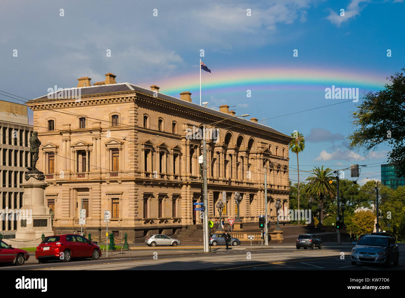 A rainbow behind the Parliament House of Victoria, Melbourne, Australia. Stock Photo