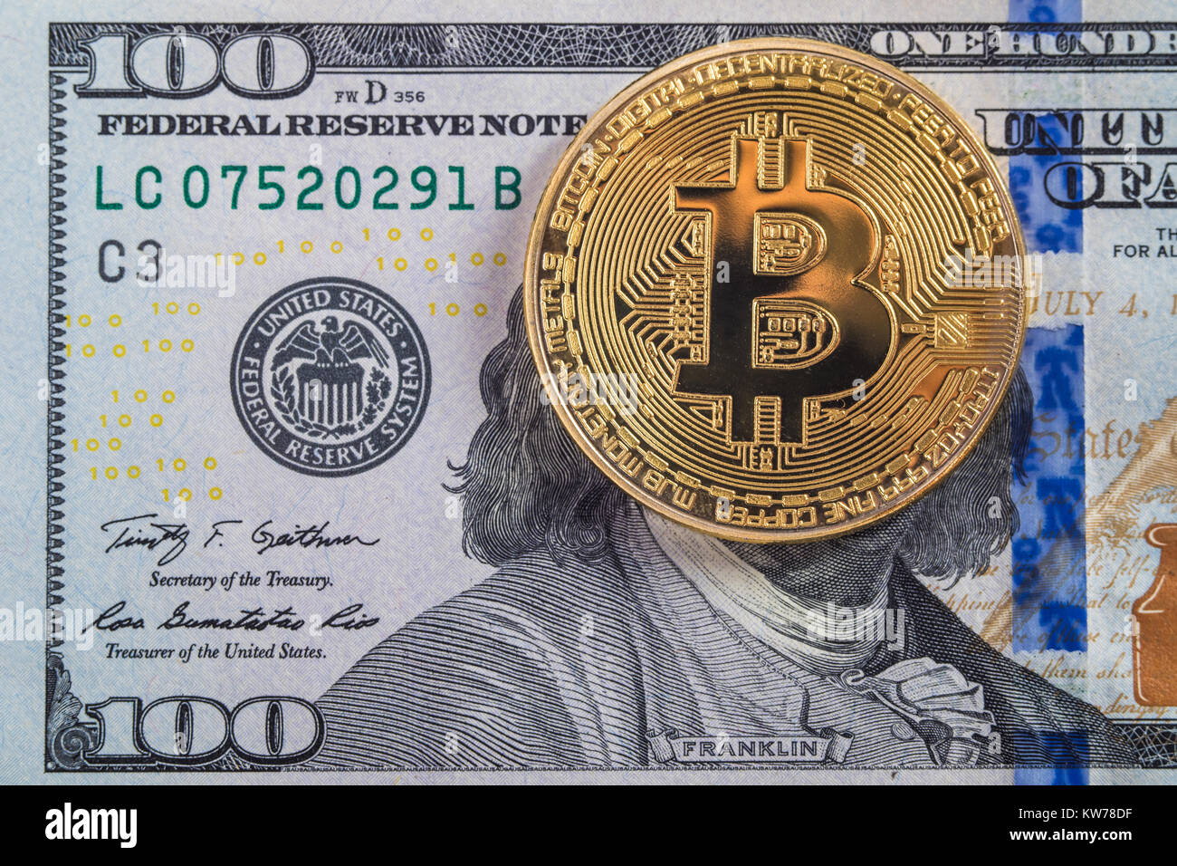 Beautifully arranged bills 100 dollar and gold coin bitcoin on a gray  background. Bitcoin cryptocurrency. Anonymous. Background for your text and  desi Stock Photo - Alamy