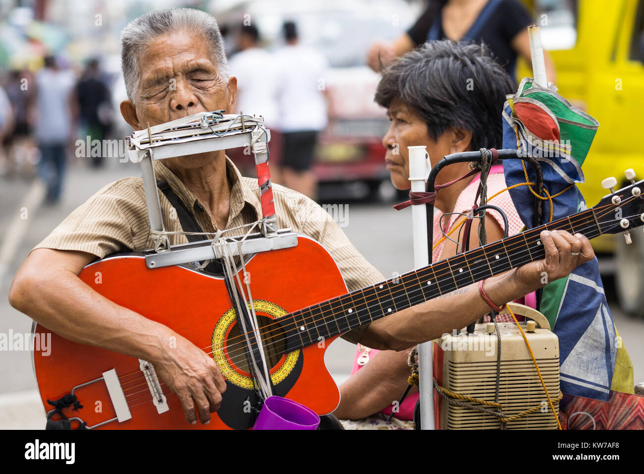 A blind man busking within Cebu City,Philippines Stock Photo Alamy
