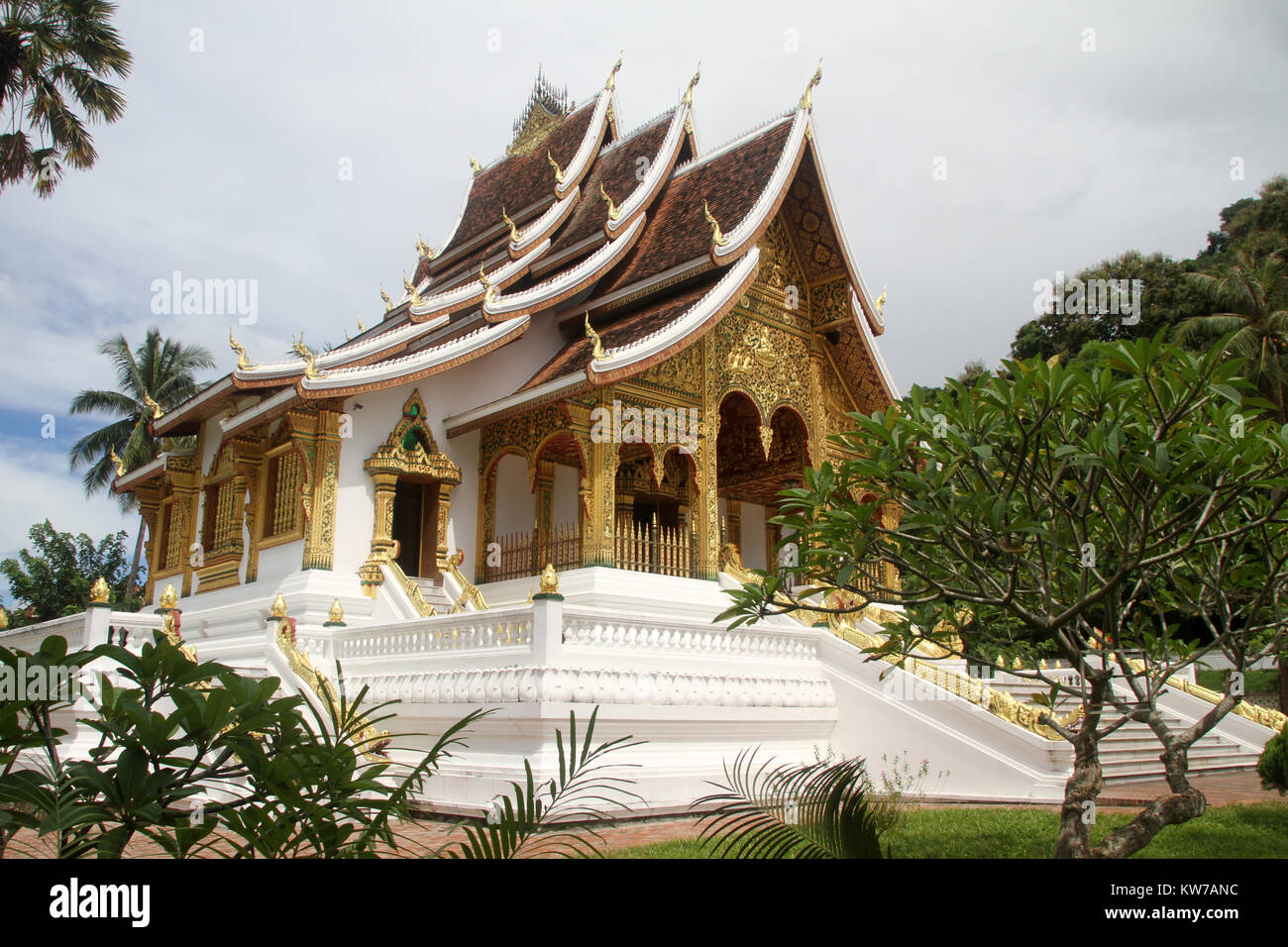 White buddhist temple near royal palace in Luang Prabang, Laos Stock Photo