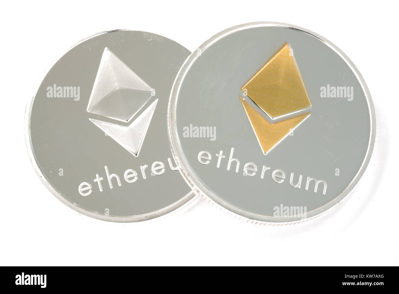 Two Real coin of cryptocurrency Silver Ethereum isolated on white background Stock Photo