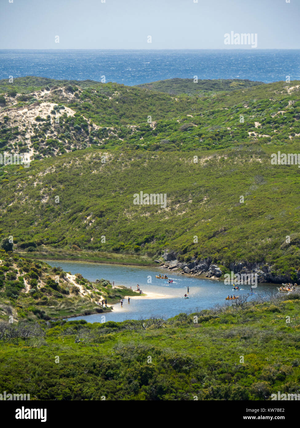 People swimming at a sand bar in a bend of of Margaret River,  Leeuwin Nasturaliste National Park, Western Australia. Stock Photo