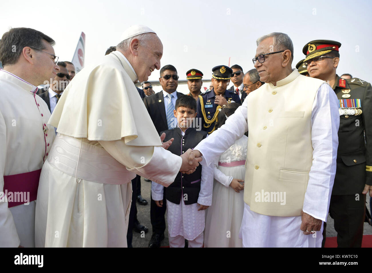 Pope Francis is welcomed by Bangladesh President Abdul Hamid, right, upon his arrival at the international airport, in Dhaka, Bangladesh.  Featuring: Pope Francis, Abdul Hamid Where: Dhaka, Bangladesh When: 30 Nov 2017 Credit: IPA/WENN.com  **Only available for publication in UK, USA, Germany, Austria, Switzerland** Stock Photo