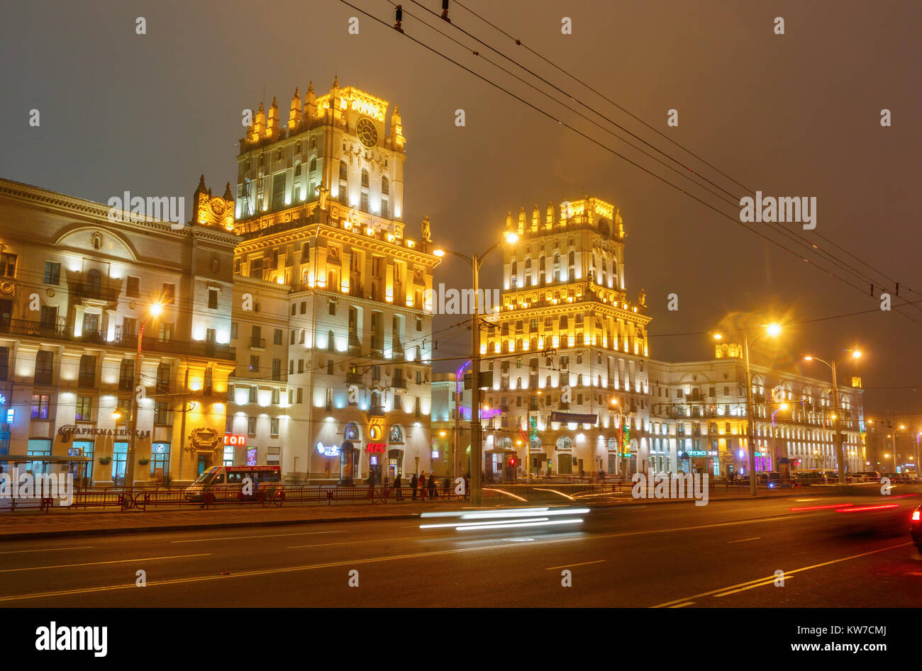 Two illuminated towers symbolizing the Gates of Minsk at Station Square on a misty night in winter. Minsk, Belarus. Stock Photo