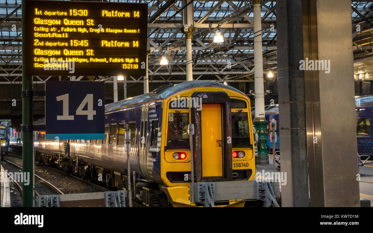 Waverley Station, Edinburgh, Scotland, UK, with trains arriving and