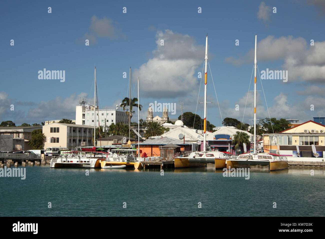 Port of St John's in the Caribbean island of Antigua, with the city & cathedral in the background. Stock Photo