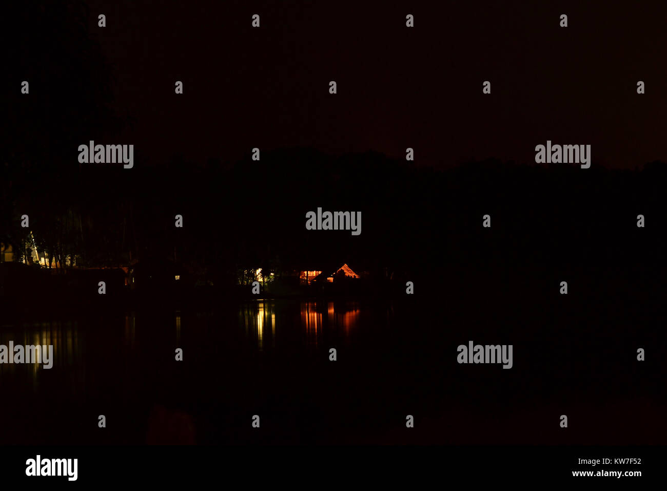 Reflections of Night at Vellayani Lake, Kerala Stock Photo