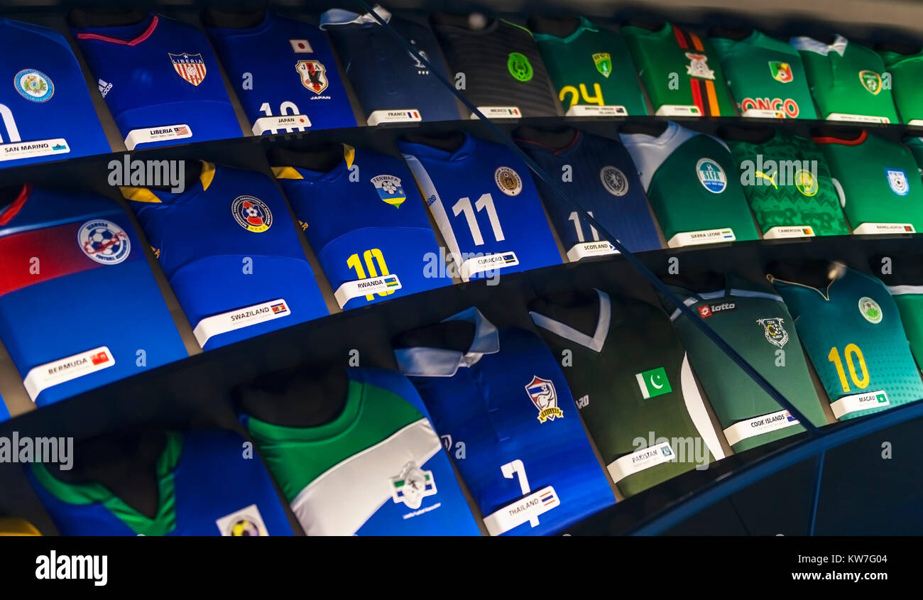 Stand with the uniforms of different national teams - FIFA members in FIFA museum. Zurich, Switzerland Stock Photo