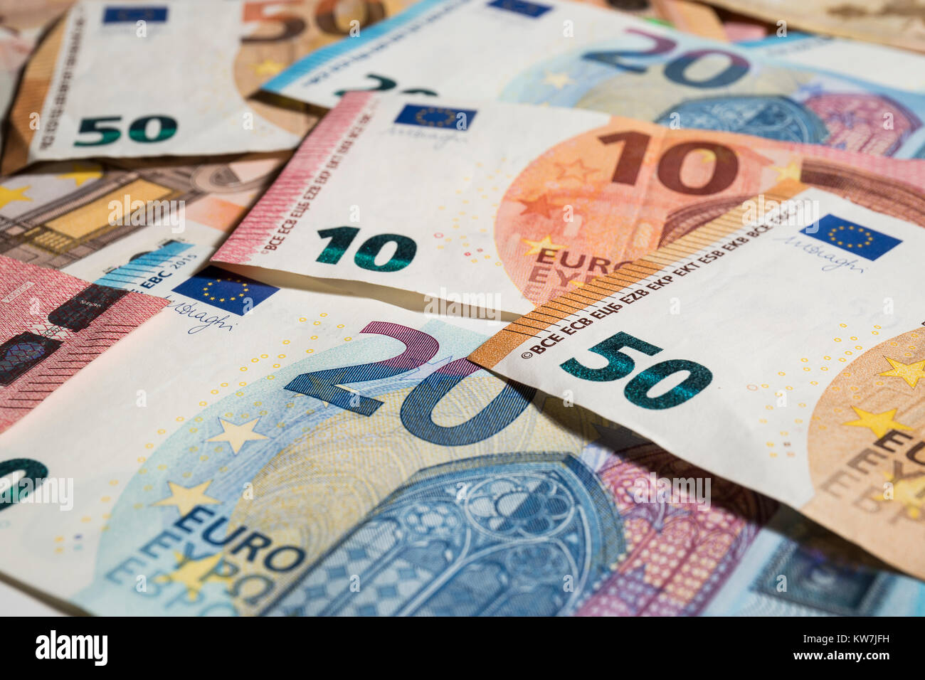 10, 20 & 50 value Euro notes, randomly arranged Stock Photo