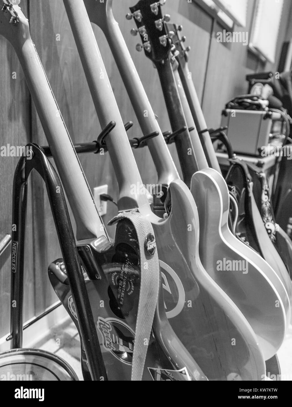 black and white detail image of a group of electric guitars Stock Photo