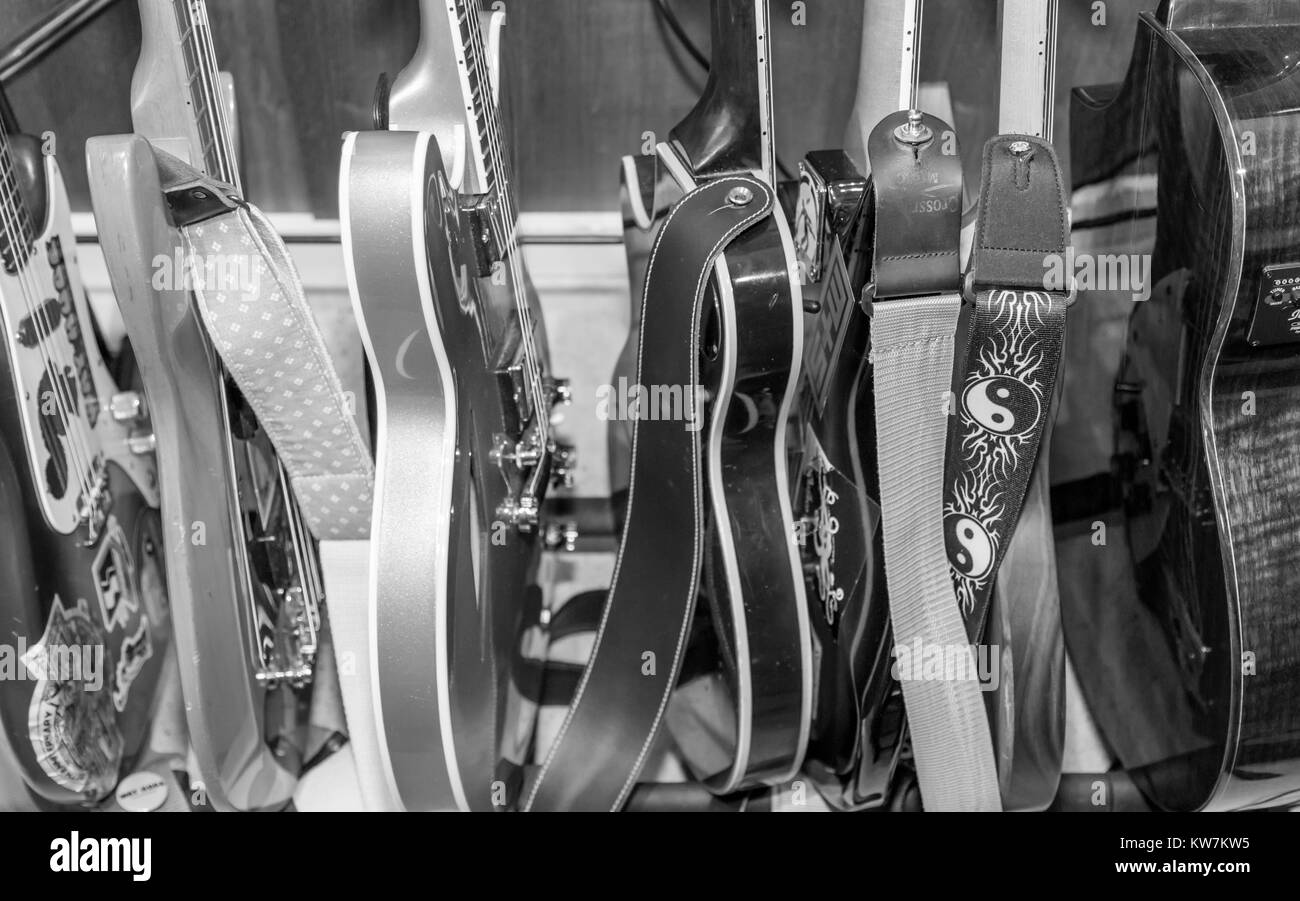 black and white detail image of a group of electric guitars Stock Photo