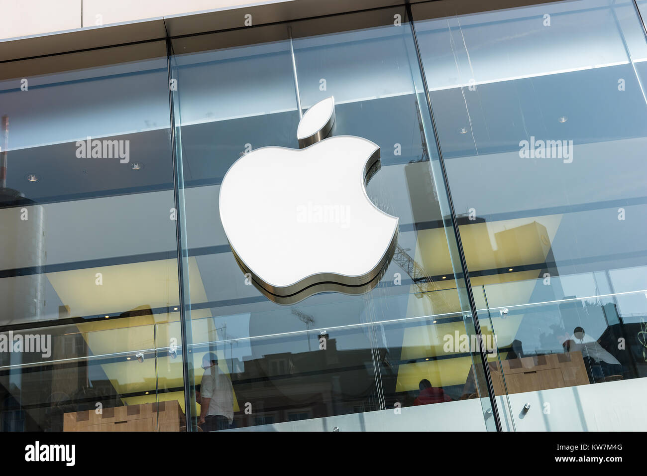 Apple Logo closeup. Apple is the multinational technology company headquartered in Cupertino, California and sells consumer electronics products. Stock Photo