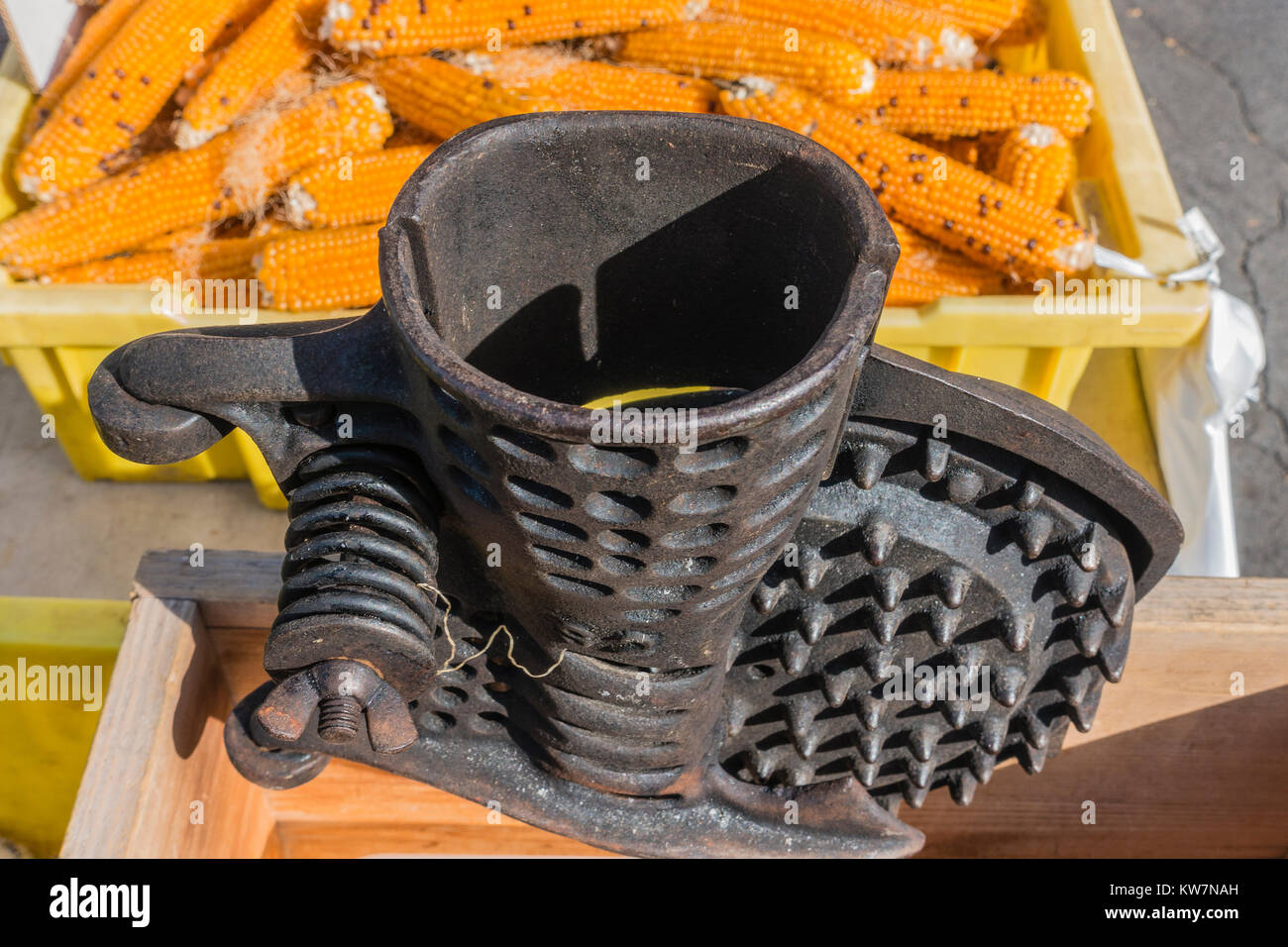 Antique cast iron corn sheller from the 19th century on display at the