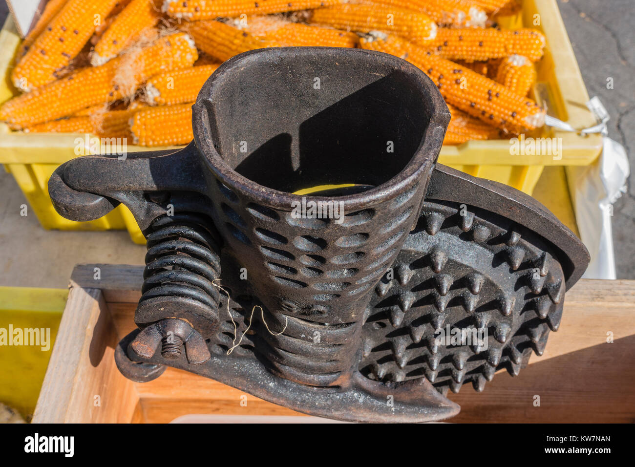 Antique cast iron corn sheller from the 19th century on display at the