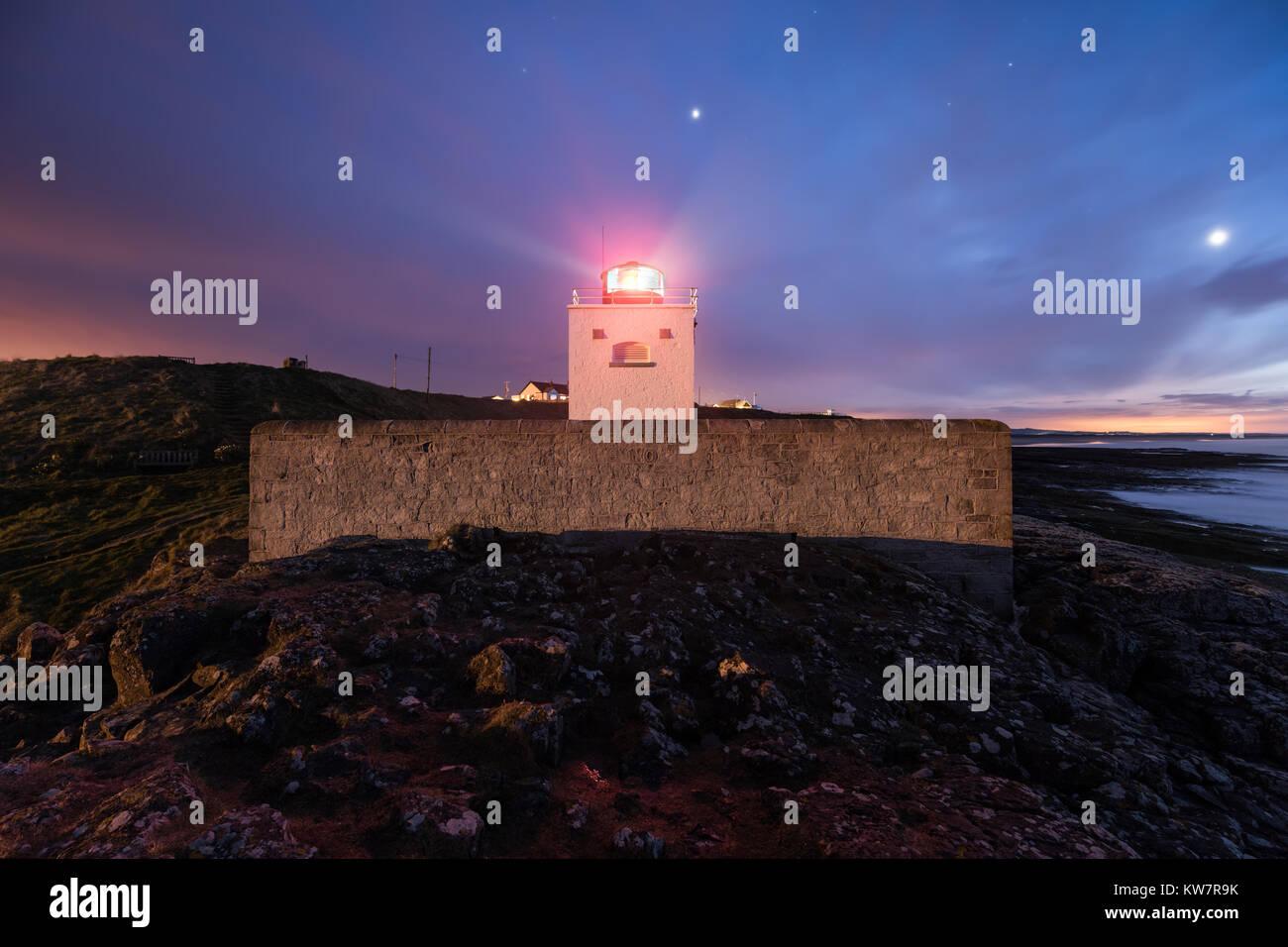Night photogaphy at Bamburgh Lighthouse Northumberland Stock Photo