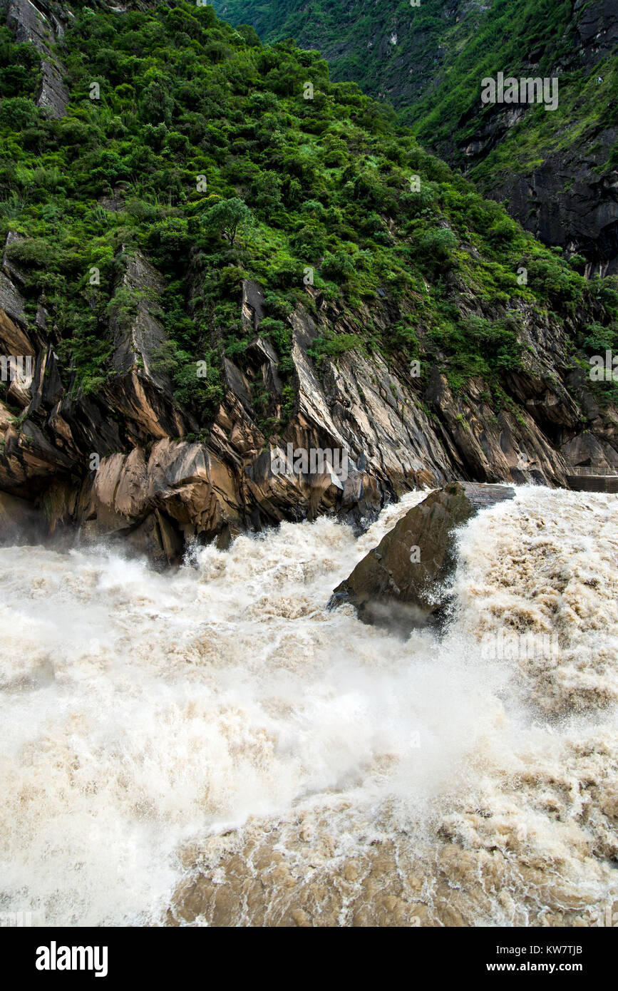 Tiger leaping gorge is a gorge formed by river Jinsha, the upper reach of the Yangtse river. It is a part of famous World Heritage Site Three Parallel Stock Photo