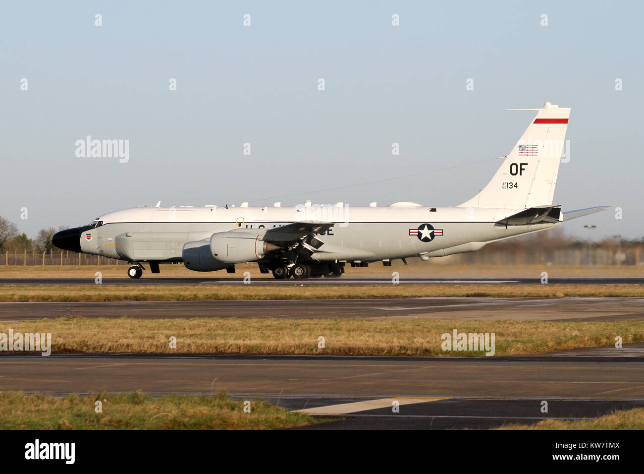 Rolling on departure at RAF Mildenhall, this deployed reconnaissance RC-135W is about to undertake a five hour surveillance mission into Europe. Stock Photo