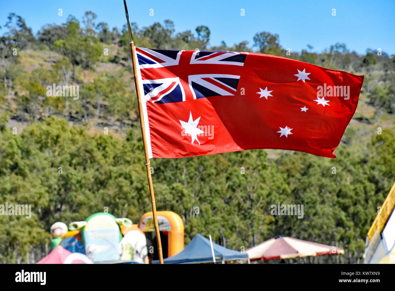 Australian flag flapping in the breeze hires stock photography and