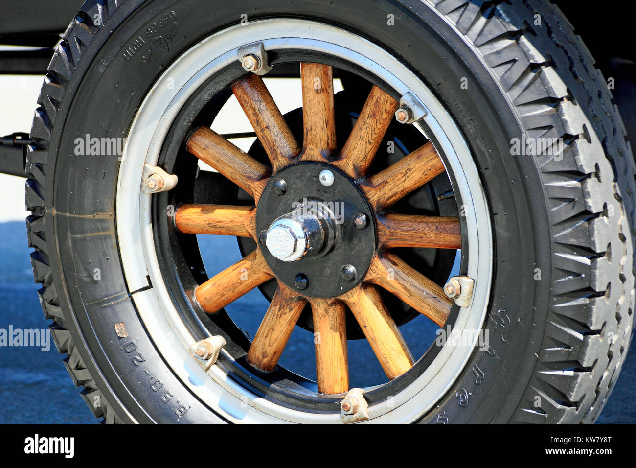 wooden spoked truck wheel Stock Photo