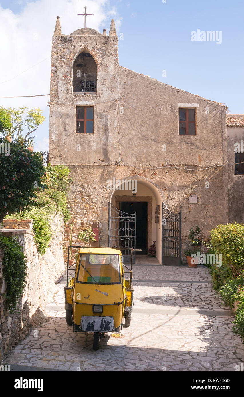 A Piaggio APE 3 wheeled truck outside the church of San Giorgio, Castelmola, Sicily, Europe Stock Photo