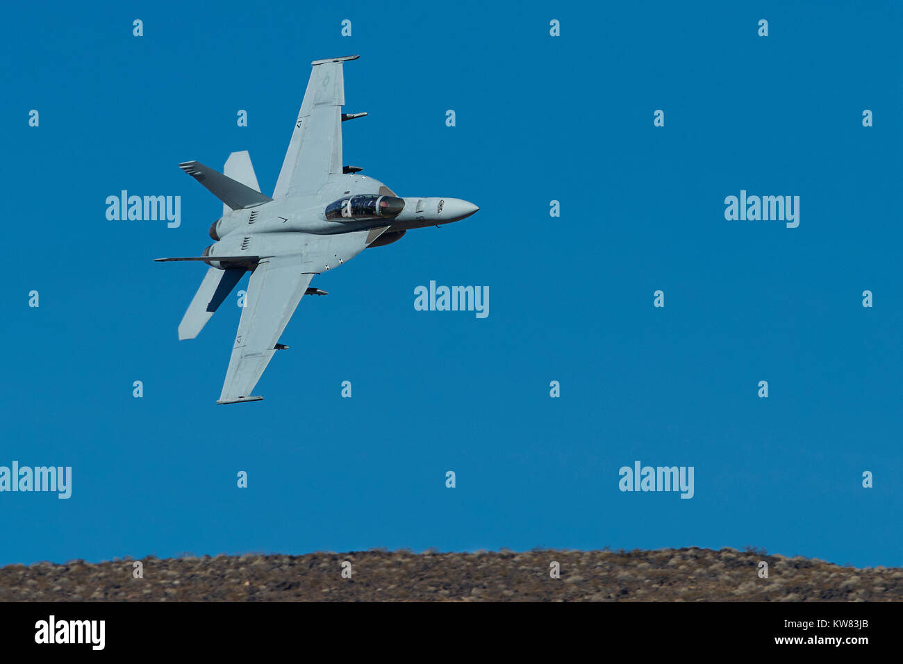 US Navy F/A18F Super Jet Fighter Bomber Flying Over California