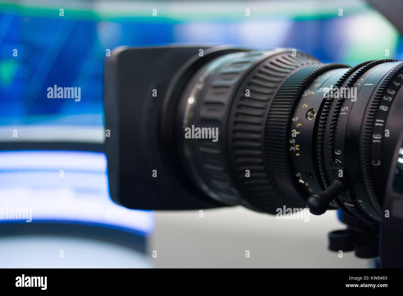 detail of video camera, film lens in blur tv studio background Stock Photo  - Alamy