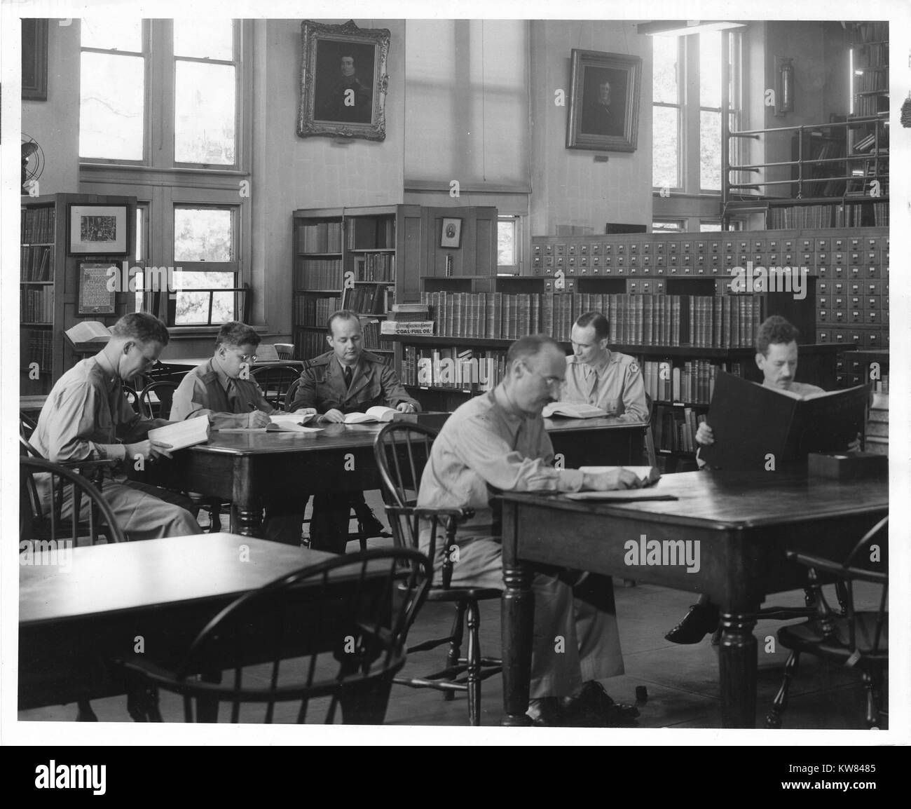 Medical men read and study at the library reading room at the National