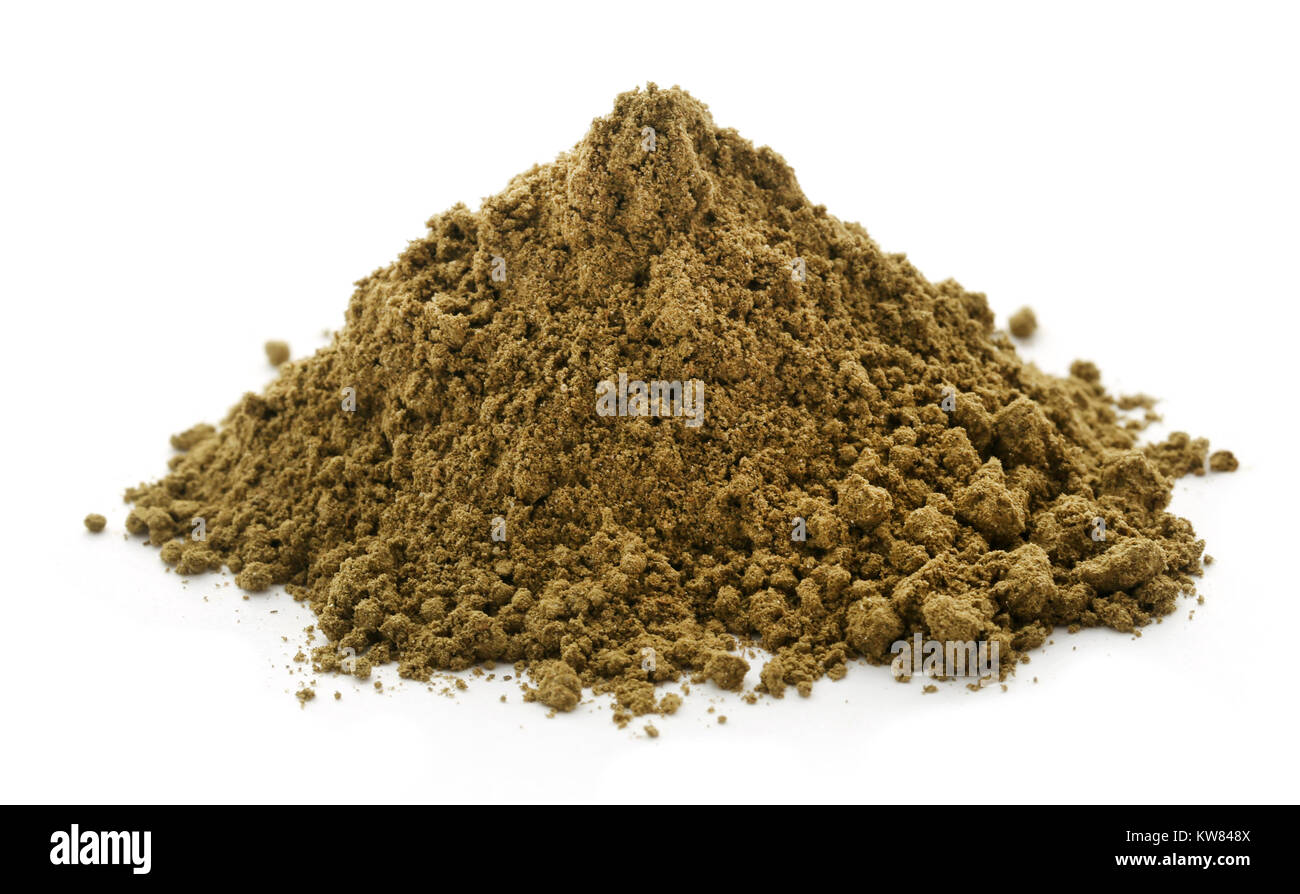 Henna hair dye powder in pile over white Stock Photo